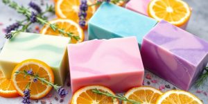 Colorful handcrafted soaps with natural ingredients on display.
