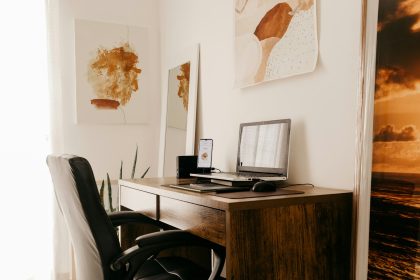 black laptop computer on brown wooden desk; First Freelance Clients