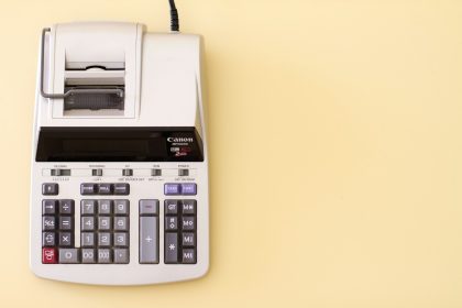white Canon cash register; self-employed tax changes 2026