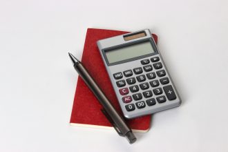 black and silver calculator beside black pen; tax mistakes