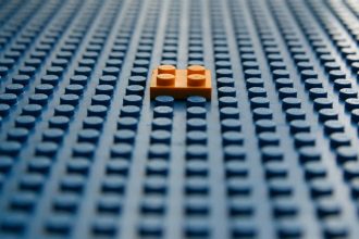 blue and yellow plastic blocks; build authority