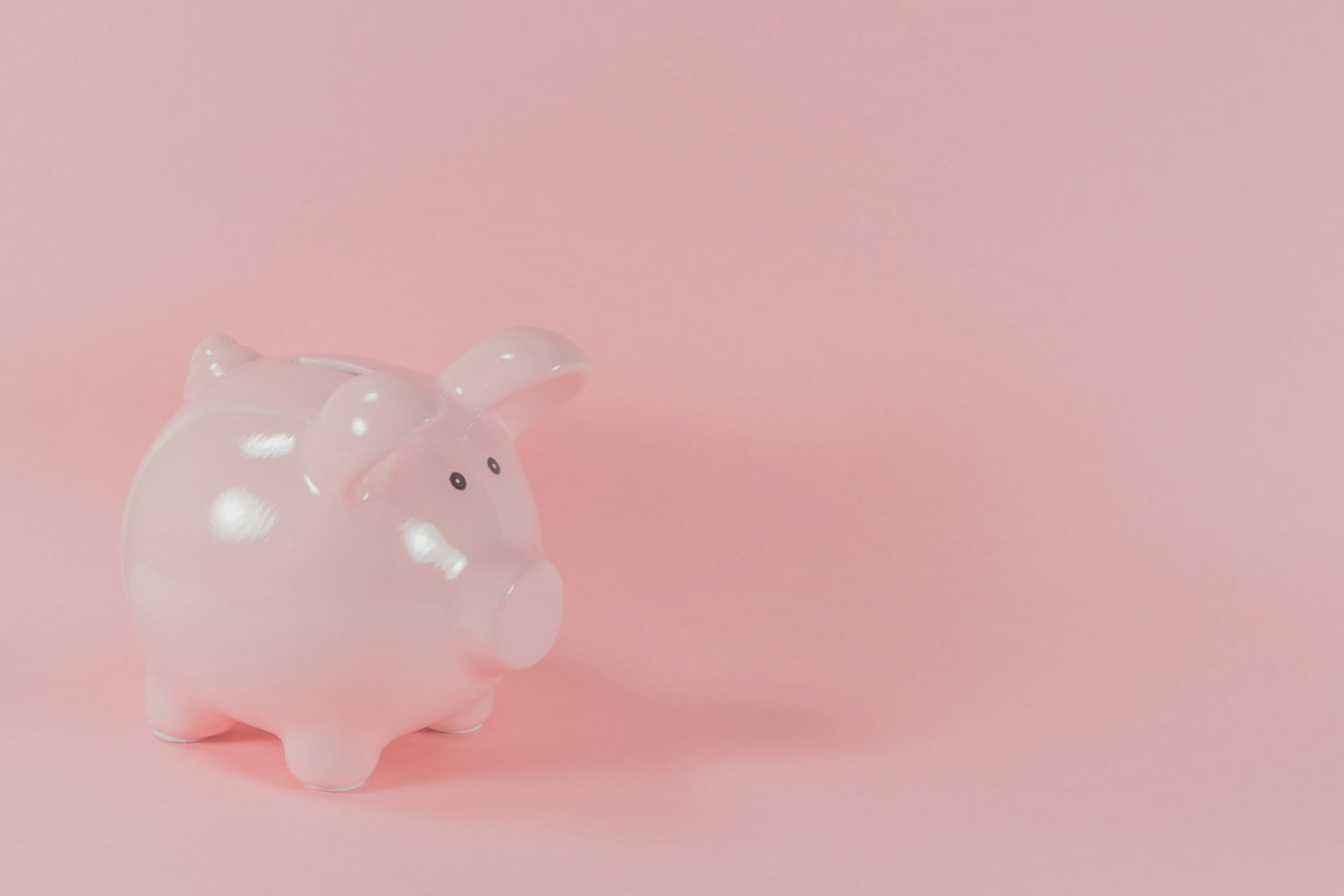 pink ceramic pig coin bank; financial flexibility