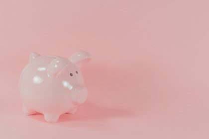 pink ceramic pig coin bank; financial flexibility