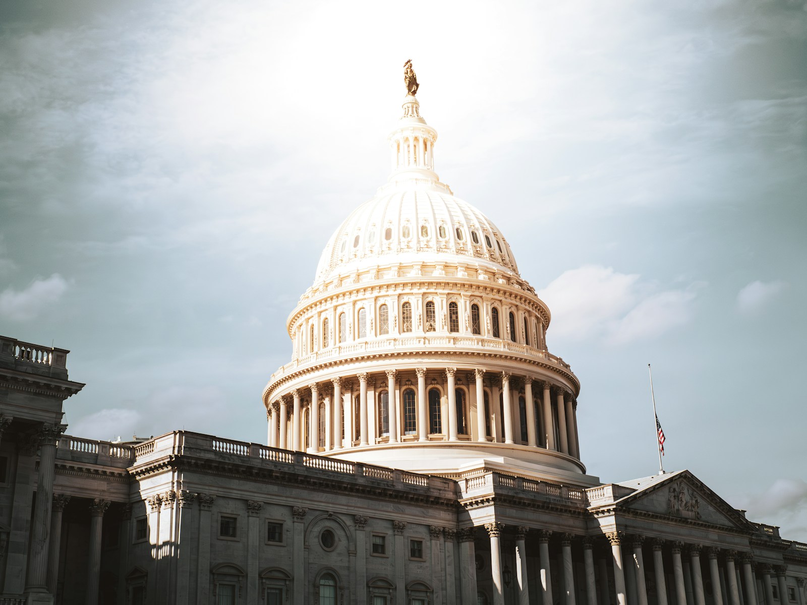 The united states capitol building under a cloudy sky; 21st Century Worker Act freelancers