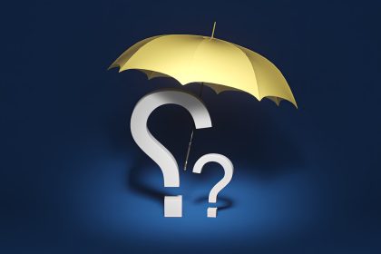 a yellow umbrella with a question mark underneath it; freelance business insurance 2026