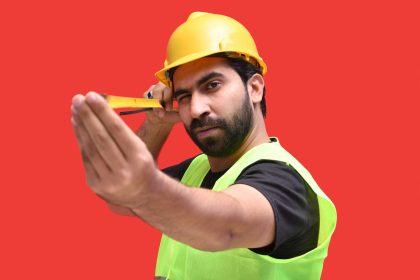 a man wearing a hard hat; what is a subcontractor