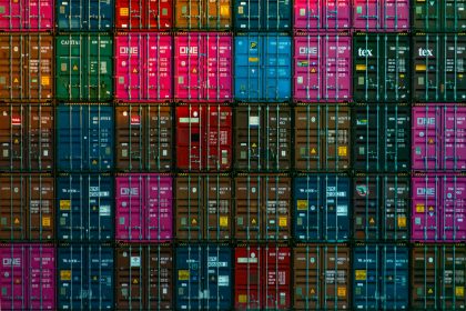 red and black plastic crates; tariffs impact self-employed