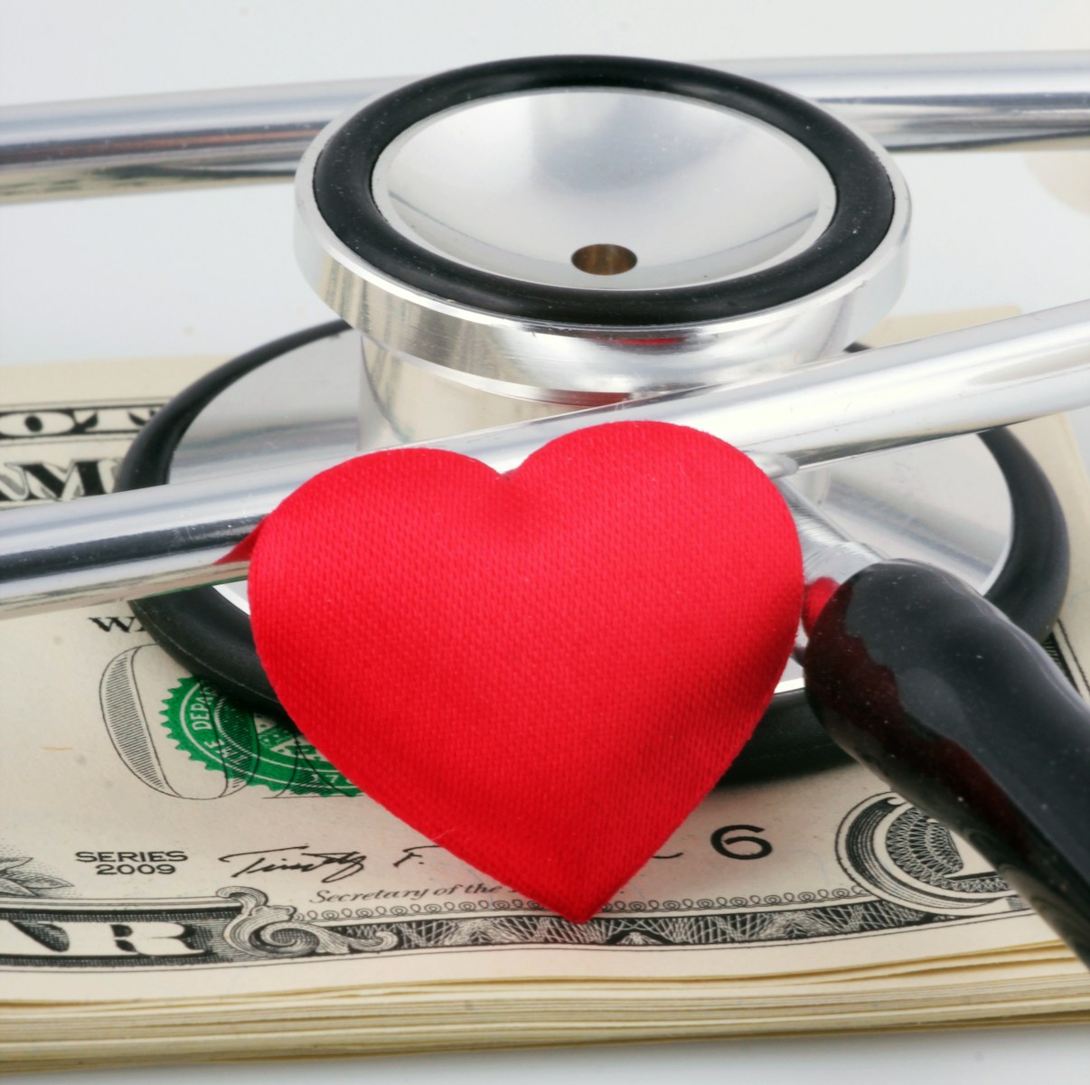 a stethoscope and a heart on top of money; self-employed HSA rules
