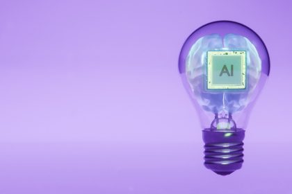 Ai brain inside a lightbulb illustrates an idea; AI training small business legislation