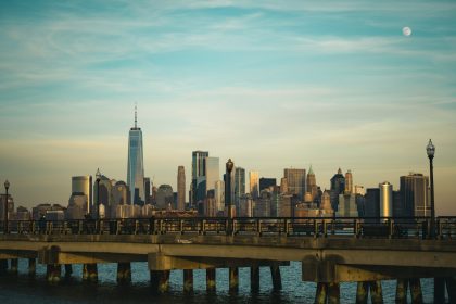 brown wooden dock on body of water during daytime; NJ ABC test rule