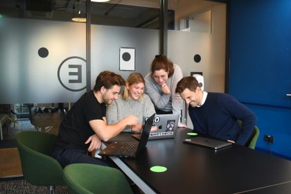 people sitting on chair in front of laptop computers; llc formation services