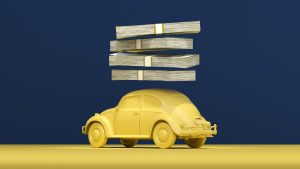 a yellow car with stacks of money on top of it; auto loans