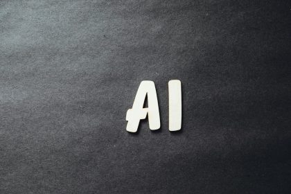 the word ai spelled in white letters on a black surface; AI solopreneur accelerator