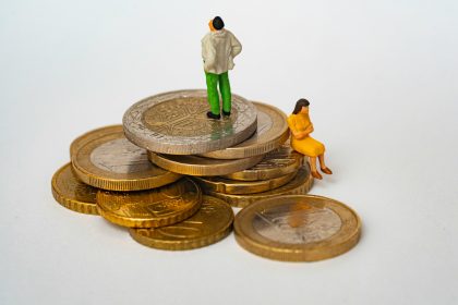 green and white ceramic figurine; Employment Cost Index Q1 2026