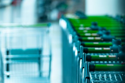 green and gray shopping carts; consumer sentiment June 2026