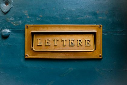 brown Lettere signage on teal trwall; what is a letter of intent