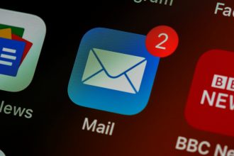 closeup of mail app icon on phone; how to write a cold email