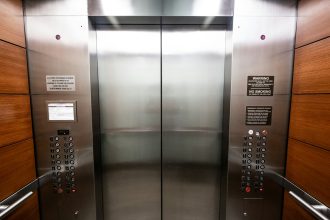 stainless steel elevator door with buttons; how to write an elevator pitch