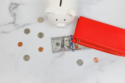 a piggy bank and coins in the snow; April construction spending 2026