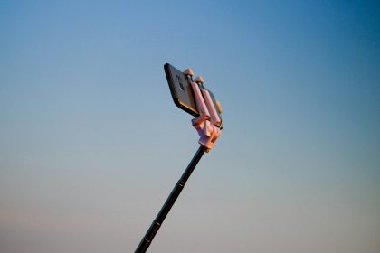 smartphone on monopod; owned audience creator economy