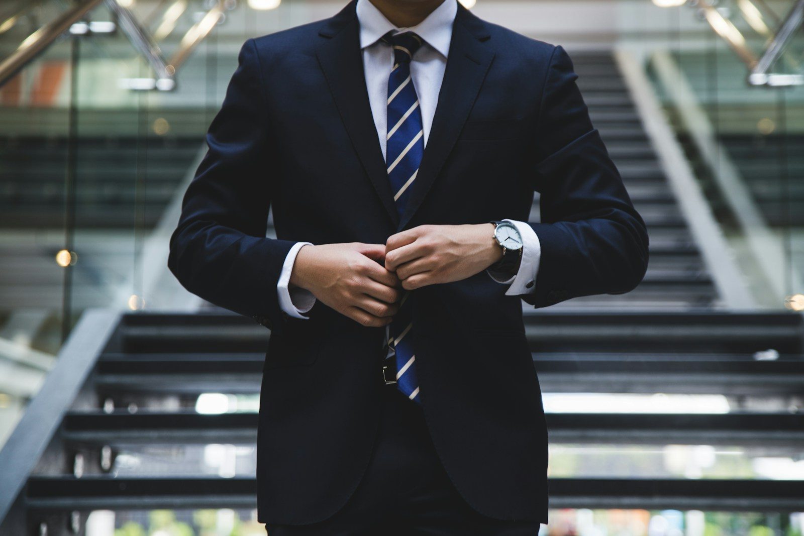 person standing near the stairs; small business jobs June 2026