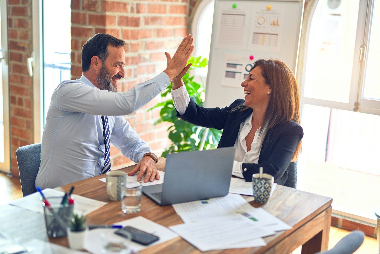 man in white dress shirt sitting beside woman in black long sleeve shirt; business formation statistics July 2026