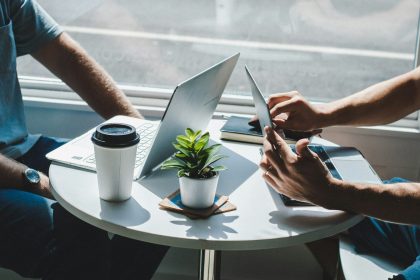 gray laptop computer; small business AI adoption