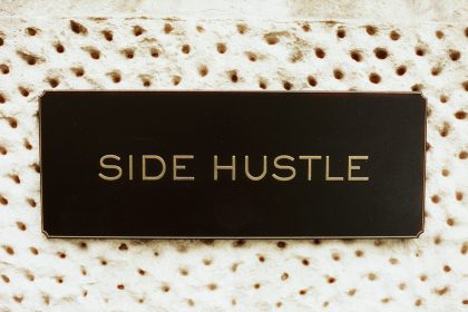 Black rectangle with "side hustle" text on textured background; side hustle statistics 2026