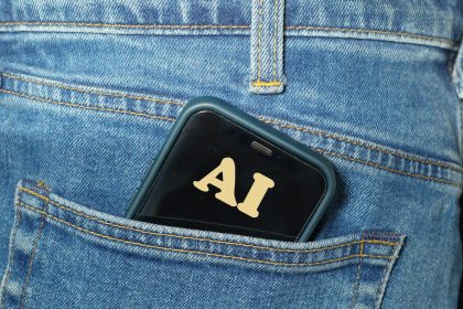Smartphone with ai text in jeans pocket; AI freelance pay