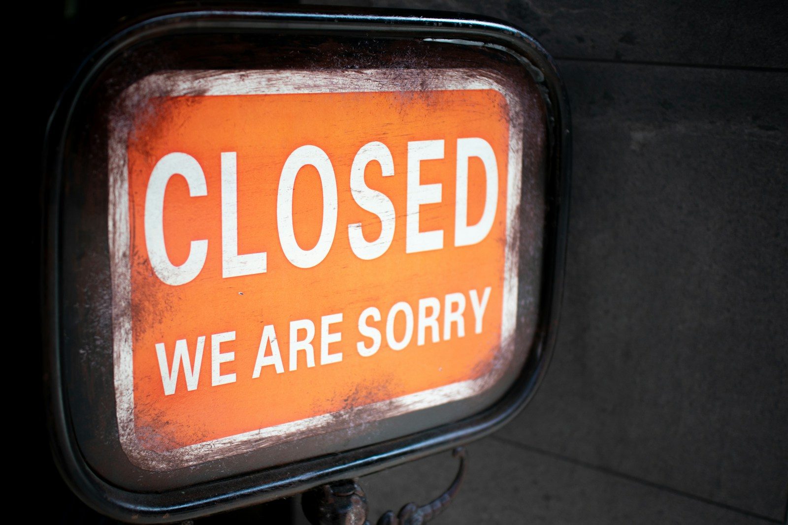 a close up of a closed sign on a pole; SMB Readiness Report
