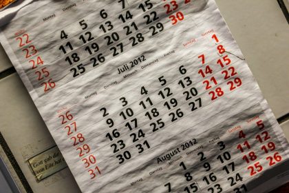 Calendar with red and white numbers; what is a fiscal year