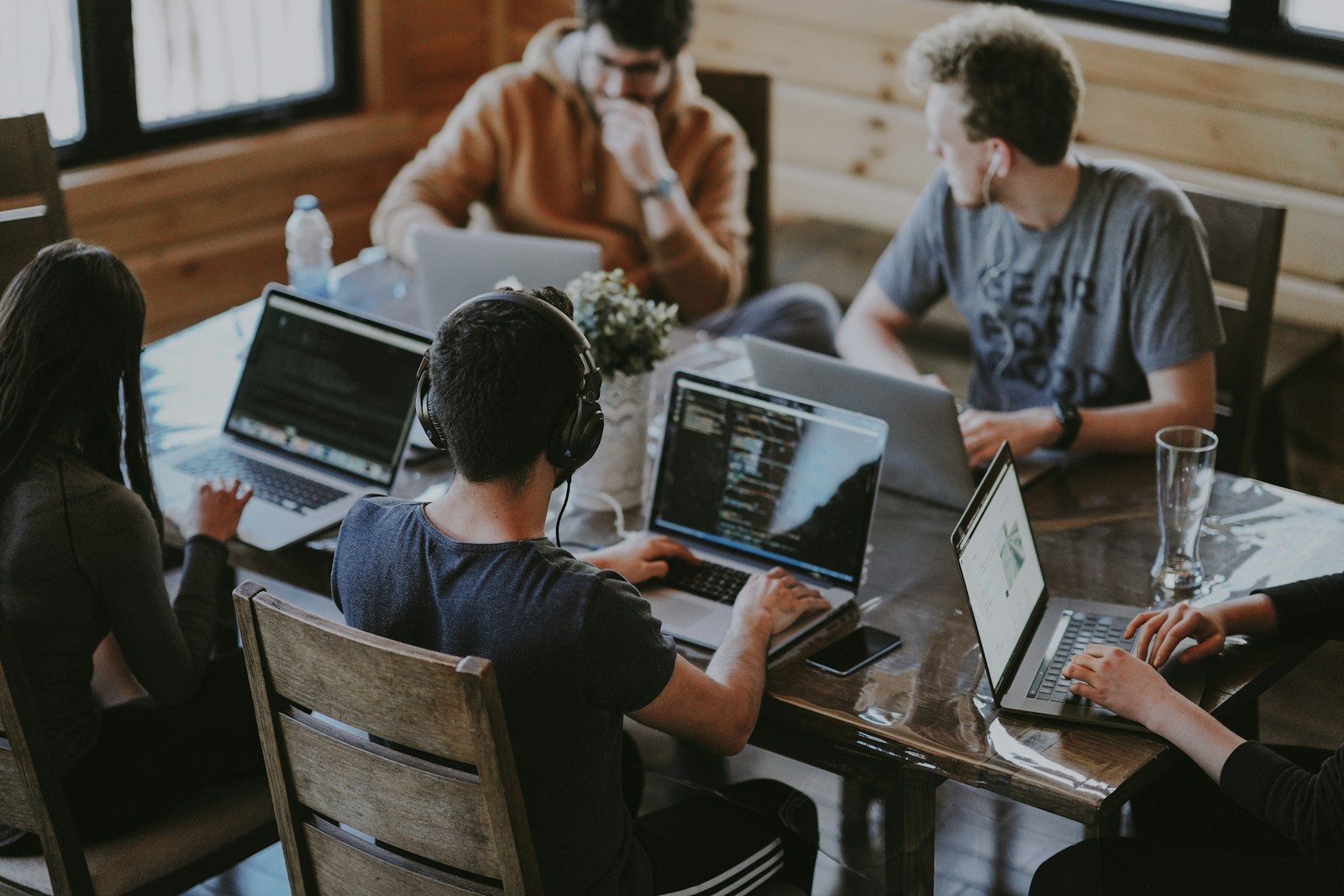 group of people using laptop computer; small business jobs August 2026