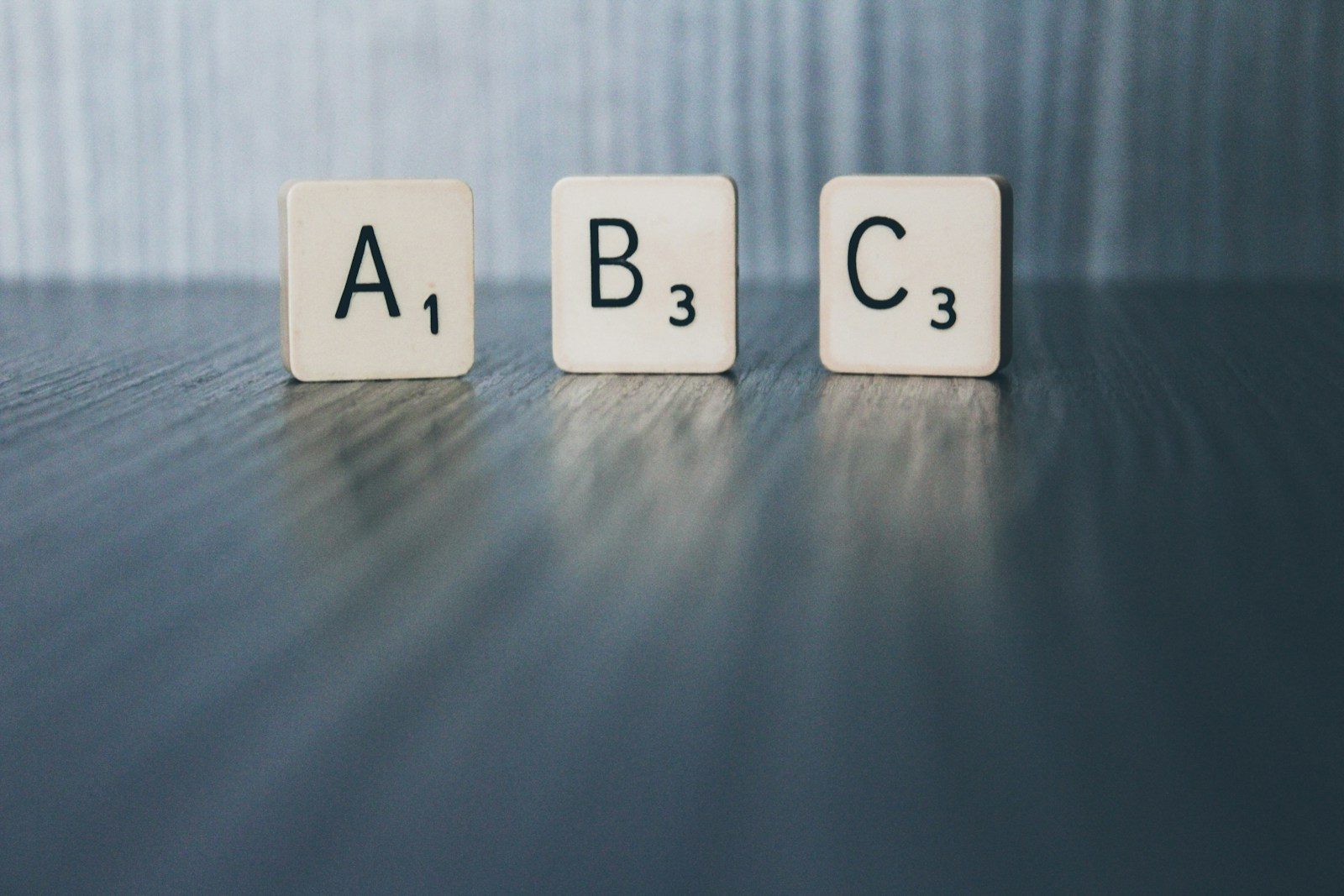 three white disc on brown surface; federal ABC test