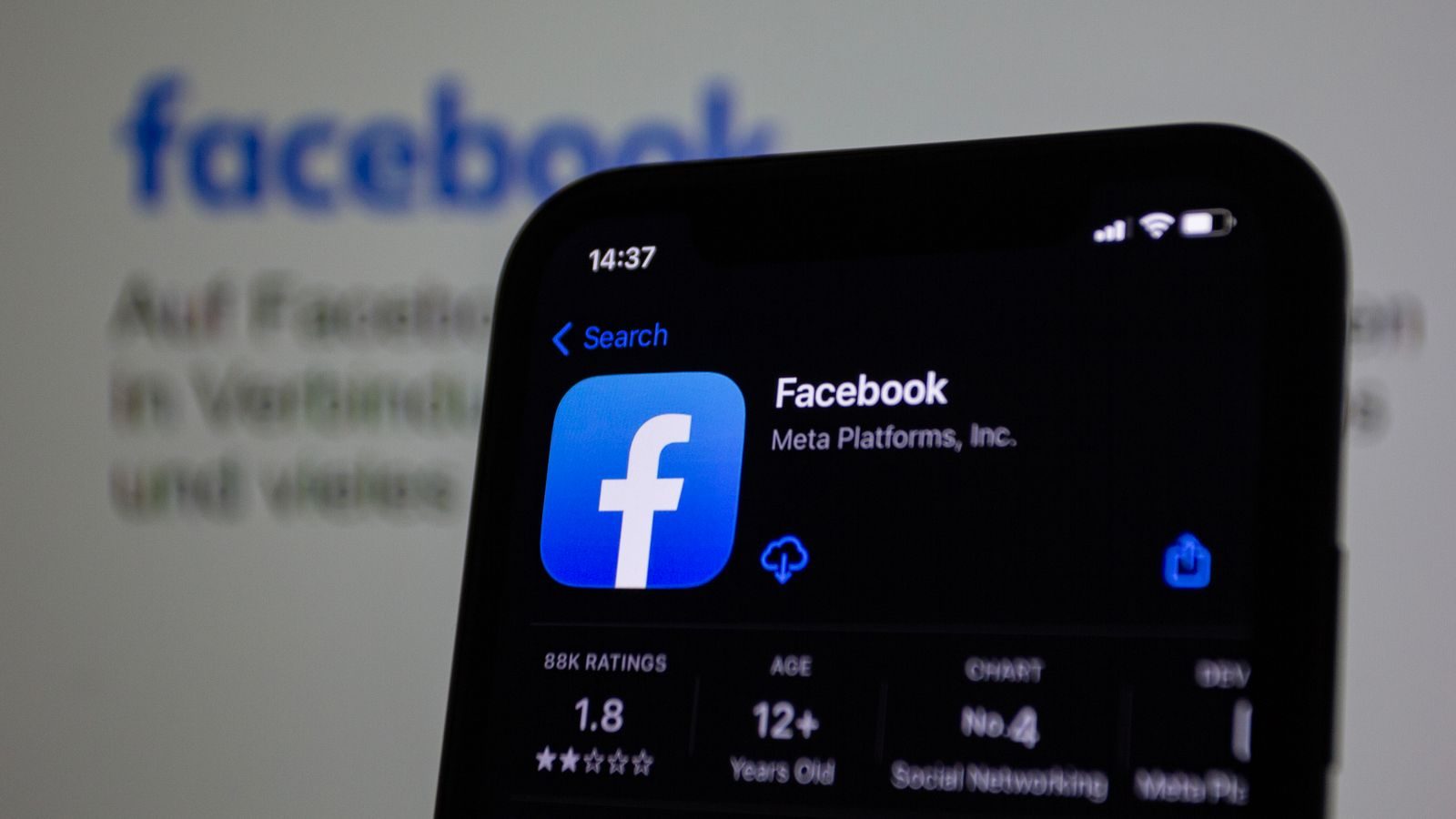 Close-up view of Facebook app on a modern smartphone, emphasizing technology; Facebook Marketplace ads